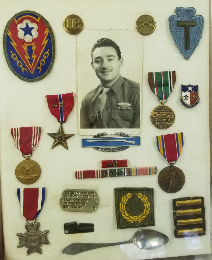 Phyllis placed Caggiano’s medals in a display case more than 50 years ago, including a small silver spoon Caggiano found in a kitchen drawer in Italy, which he carried throughout his time in Europe. 