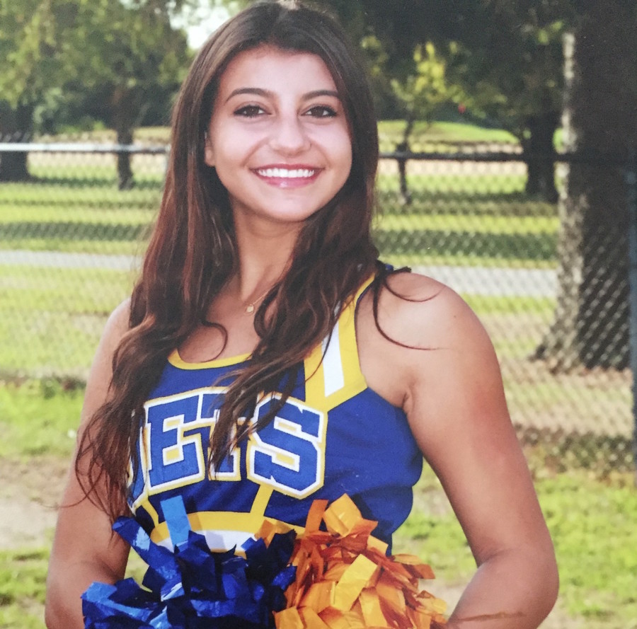 Cameron Rubbo, a cheerleader on the East Meadow High School's varsity cheerleading team, has been with the team since her freshman year. She is now a senior. 