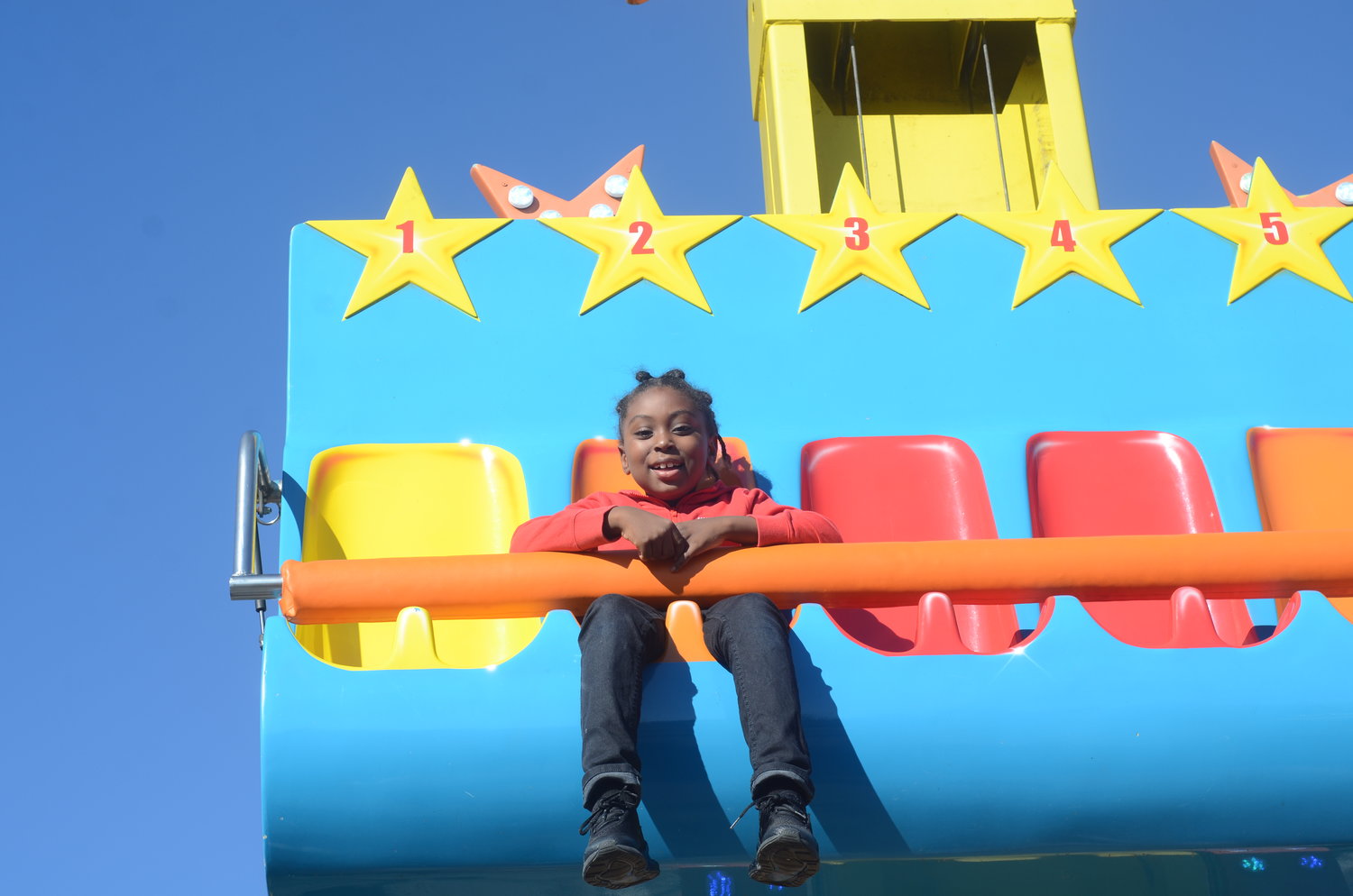 Makai Sneed, above, and his mom came from Queens to the carnival to see what the excitement was all about.